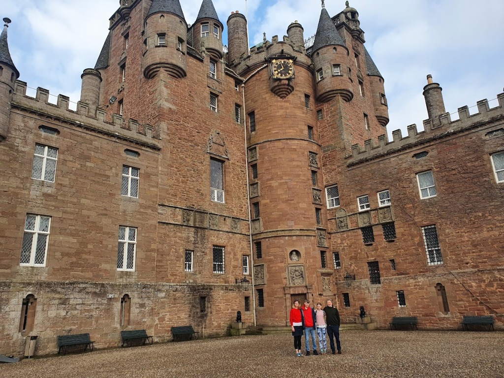 The four of us standing outside Glamis Castle