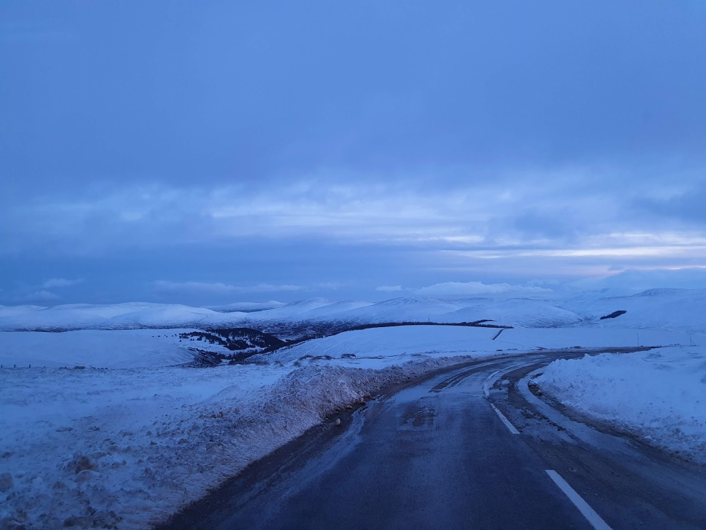 A photo from the car window of the drive down from the Lecht.