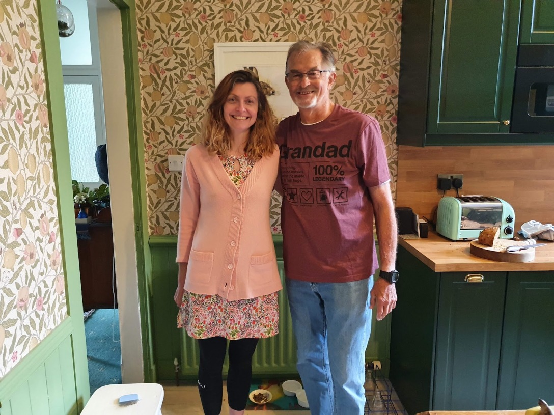 Dad and Rachel standing in the kitchen